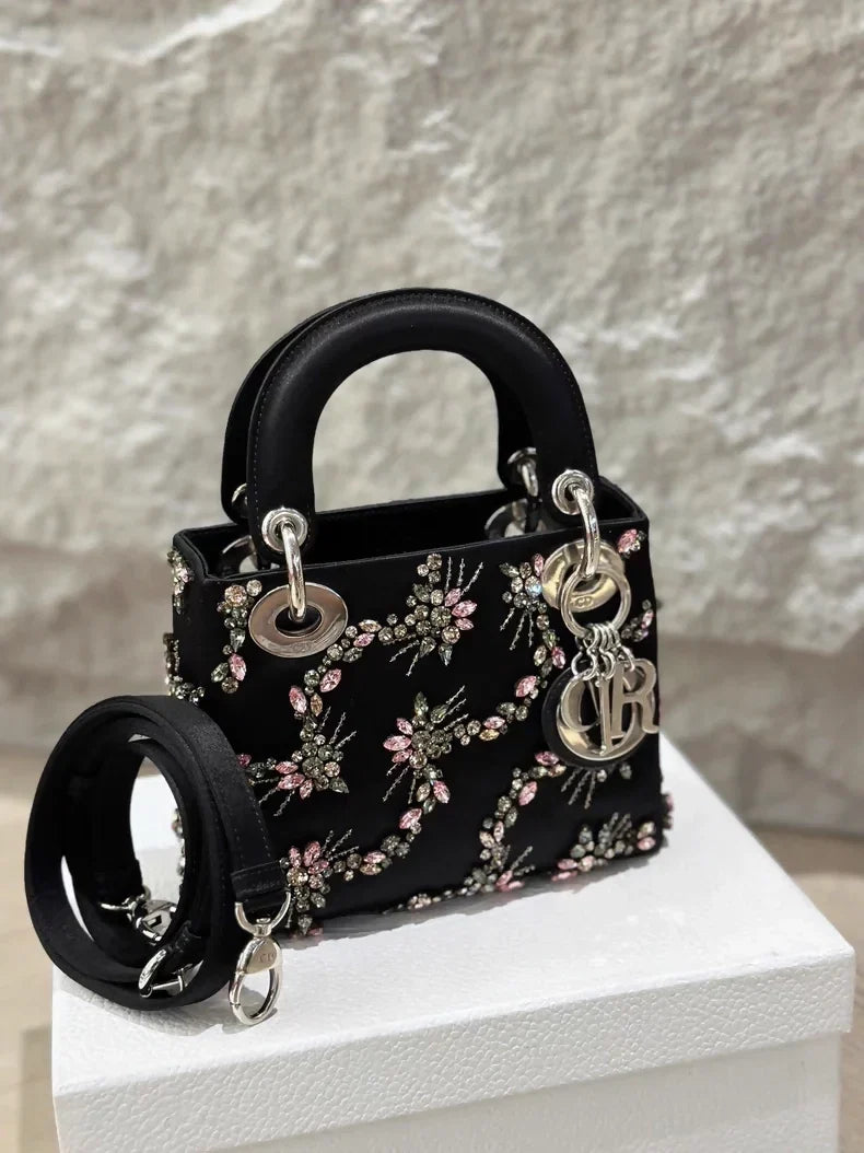 Lady Dior small black silk embroidery bag with silver hardware