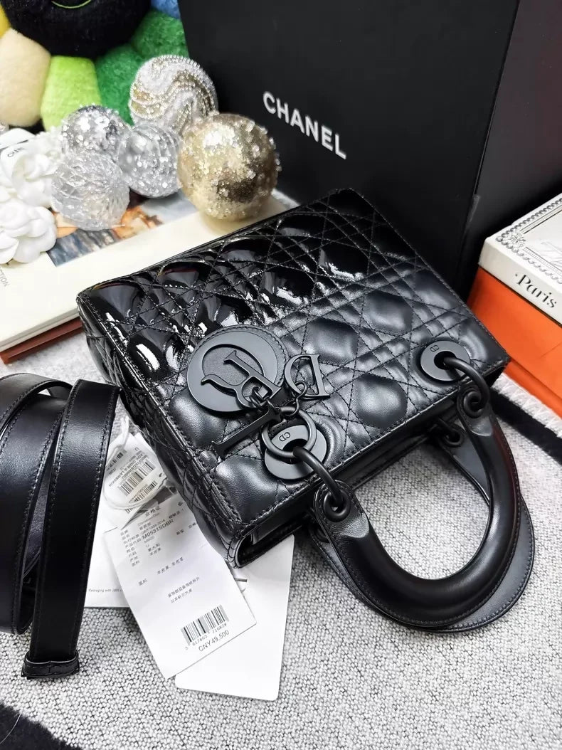 Dior Lady Dior bag in matte black with calfskin and patent leather accents